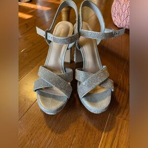 Sparkling prom heels size 7 1/2 they have been worn once like new